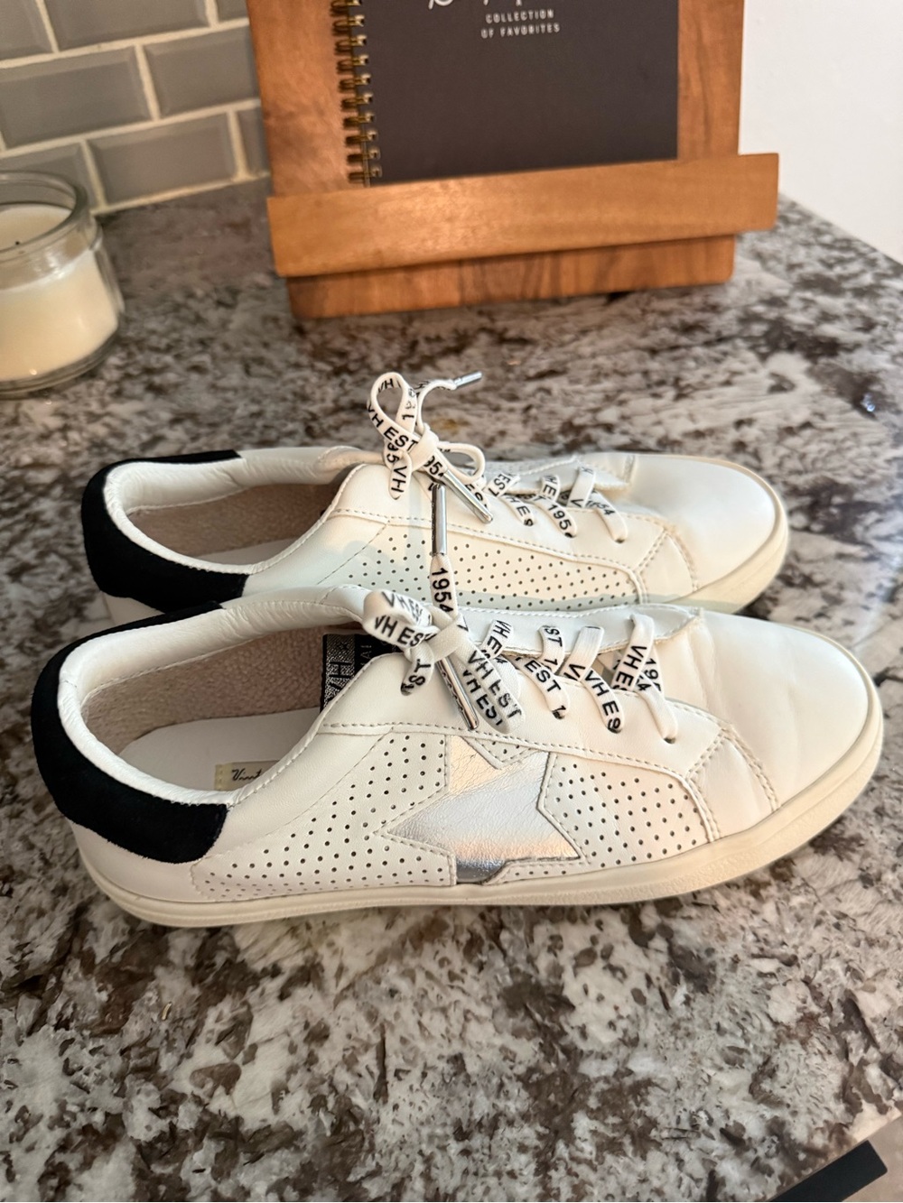 Vintage Havana White Leather Sneakers with Black Heel and Silver Star Accent